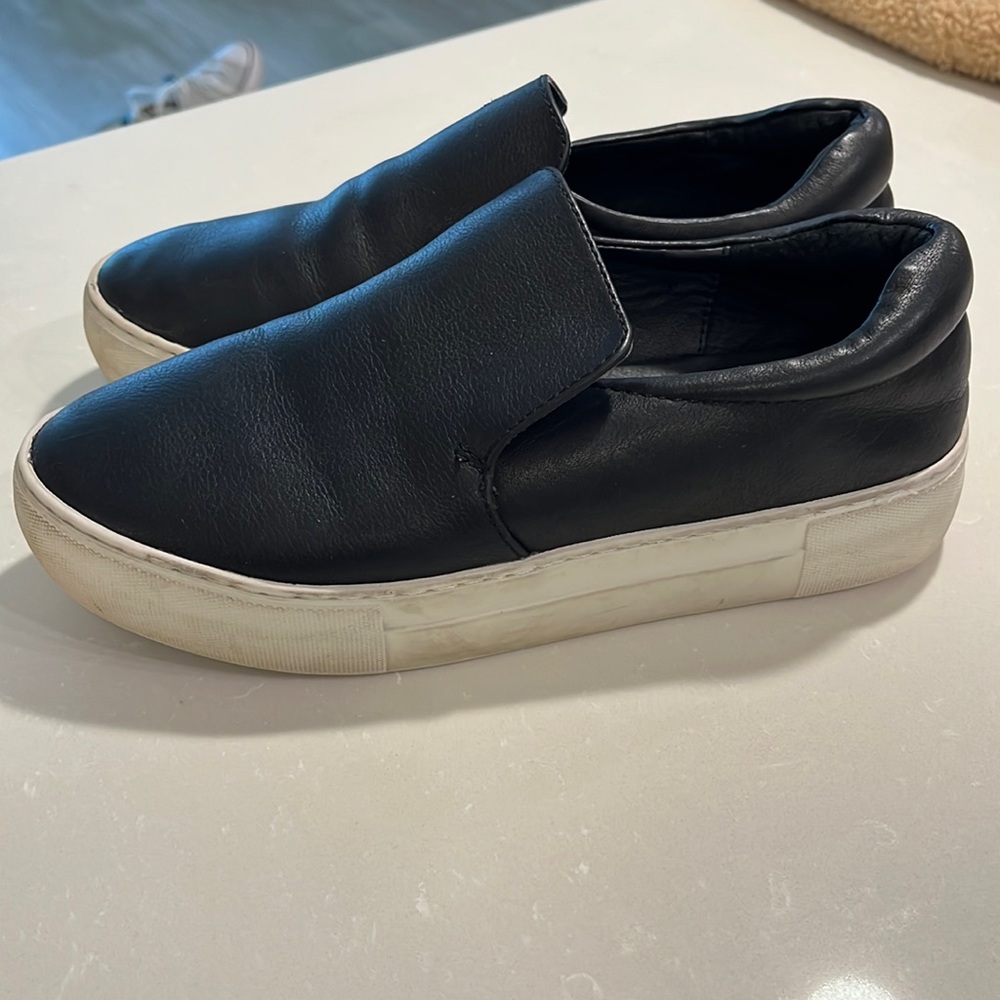 Black leather platform slip on shoes